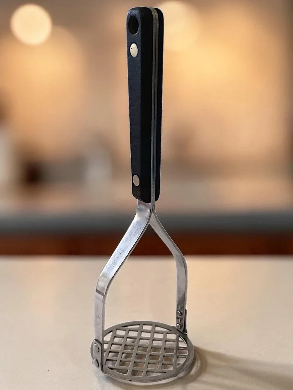 Vintage Flint Arrow Potato Masher Stainless Steel Black Handle USA Kitchen Tool